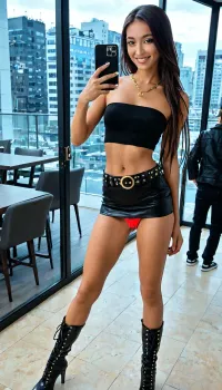 Raw picture, iPhone 15 pro photo, warm light, Brazilian model, (skinny:1.2), skinny 32 years old, smooth dark brunette long hair, thigh gap, (very long hair, perfect clean pussy:1.3), (micro-skirt, belt in the legs:1.3), busty, velvety skin, full lips, and a look of tenderness and passion, looking at the camera, smiling, slim, brown necklace, taking a selfie in luxury bar, public, There are a lot of people around, girlfriends are standing nearby, flashphoto, dark light, skin detailed with skin imperfections, wearing A sleek black long-sleeve mini dress with a high neckline and a bodycon fit that keeps the line clean and sharp., [Allegato], Styled with tall brown fringe boots that swing with every step—Western energy, but make it flirtier and more fashion-girl., The dress reads opaque, with the boots doing the “extra.”, detailxl