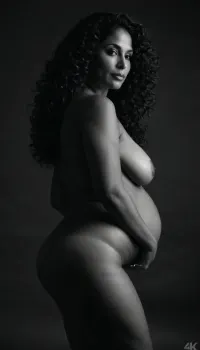 dark background, 40 year old woman silhouette, Latina milf, slim thick, curvy, long curly hair, medium natural sagging breasts, wide hips, slim waist, love handles, saggy belly, stretch marks, cellulite, wrinkled skin, skin imperfections, pubic hair, very sexy poses, perfect nude body, monochrome, realistic, 4k, high quality, art. Fupa. Big ass. Circle ass