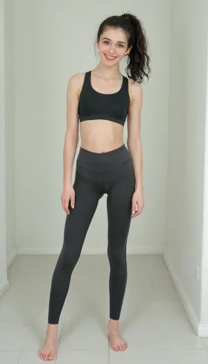 A young petite timid college girl of 1m60 height, bathroom, smiling at me. black wavy hair in a ponytail. wearing long black highwaisted runningpants, wearing black sportsbra, playful, realistic skin with many moles and imperfections, anorexic, slender figure, Detailed natural skin and blemishes without-makeup, close, perfect eyes, skin blemish, facing you, front view, bare feet, slimwoman, flat chested, <lora:pyroV4-256:2>, <lora:flat_chested_v3.5:.8>, Detailed natural and blemishes without-makeup, <lora:skin_4-000015:.3>