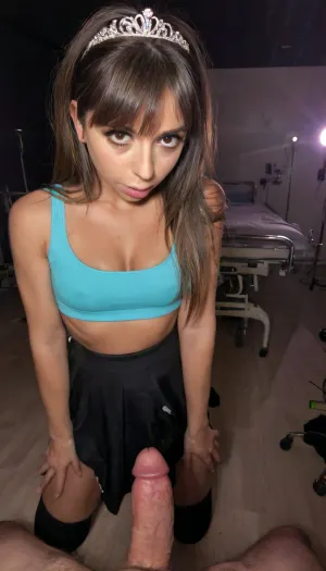 amazing quality, 8k, raw style, NSFW, kneeling in front of a man, front_body_view, man's extremely huge penis close to her face, young girl, Sand skin tone, slim body, sexy sporty bra, sporty skirt, long sporty tights out of view, torn clothes, deep brown eyes, dark brown hair, tailbone length loose hair, hair side-bang, hair_behind_ear, tiara, (((in an hospital))), Bolex_H16 style_shot, high_angle_shot, close_up_shot, (((Volumetric_Lighting)))