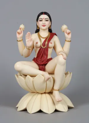 Indian ivory goddess Lakshmi, sitting on a lotus flower, she has white skin, red sari, gold jewelry, four hands, (upper pair of hands she holds a lotus flower each and lower pair of hands she shows mudras 1.6), realistic lighting, clear description of bone statuette.