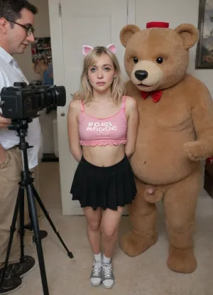 (18 year old boy jerking off an older fat man), (other people watching), (lots of fat old men watching), boy crying, sobbing, boy worried, boy looking on in fear and annoyance, (boy is Luna Lovegood cosplay with short blonde hair), (guy in pink teddy bear top inspired by her unique and quirky style from the Harry Potter film series), (top should be soft pink with a teddy bear face on the hood with bear ears. Pair it with a light gray A-line skirt with barely there pleats or lace trim), boy in Mary Jane style sneakers, (camera on tripod in foreground pointed at boy), (1 camera), (set in a tacky love hotel with plush), (boy has a small penis visible, penis erect and wank)