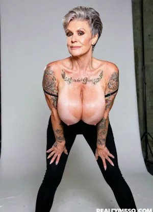 Really busty bourgeois grandmother exposes herself, real granny face, oversized giant breasts, perfect face and very skinny body, different angles poses, studio background, full body tattooed
High detailed photo, high quality photo, 8k photo