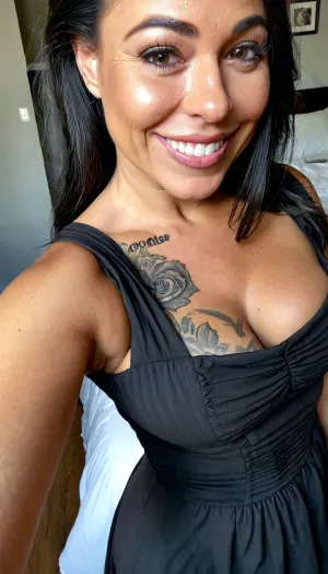 Ultra realistic, sexy mature, sexy 30 years old Mexican wife, dark black medium hair, slim thick, cute shy smile face, very cute charming and sexy, wearing dress, in bedroom, small hidden tats, up close selfie, photo, <lora:mobile:.5>