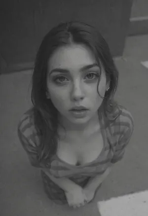 Moody black and white, monochrome, high contrast tones, natural harsh sunlight, closeup, from above, Decayed photo, vintage, film grain, film burn, extremely long hair, sidewalk, depth of field, blur, motion blur, fog, dust, haze, small body, chubby, youthful girl, holding her throat very tight, hand grasping throat, girl chocking, struggling, spit, salamis, gagging, eyes rolled into the back of her head, happy, optimism, makeup, perfect makeup, very tight checkered dress, youth, cute, very tight chest, long nipples, city street, stone buildings, street photography, very high contrast, fdec, eoriol, black, and, white, estevan, oriol, bw, grainy, chicano, culture, chola, lowrider, tattoo, 35mm, film, gangs, <lora:fdec:2>, <lora:Estevan_Oriol_Photography_Style-000005:2>