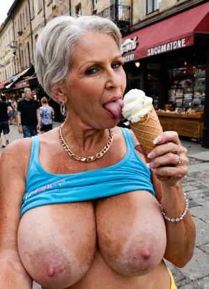 Very busty 70 years old skinny grandmother loves licking a giant icecream, extra large oversized siliconed boobs, real massive oversized tits, real grandmother style, fake jewels, street background
High detailed photo, flash photo, selfie, profile portrait