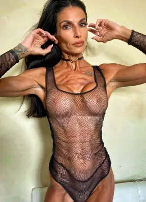 Very dark room, ambient lighting, hands in hair posing, phone photo, moody, pov handjob, close up, black fishnet suit, old, 50yo, old skin, choker, tattoos, sexy neck, ((Italian black hair old mom woman)), (tan skin), (skinny:1.3), beautiful instagram model face, (muscle fit body:1.3), very beautiful, perfect skinny body, perfect face, looking at the camera, perfect eyes, (skinny fit), pretty, snub-nosed, long hair, 4ng3l, face, bmbplora, <lora:SDXL_BetterFaces-LoRA_v1:.8>, <lora:bimboxl_02:.8>, <lora:clothed_small:1.8>