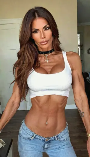 POV lapdance, white tee and jeans, ((old, 50yo)), handcuffed, choker, tattoos, sexy neck, ((old brown hair mom woman)), (tan skin), (skinny muscle), (beautiful Mexican instagram model face), (fit body), very beautiful, perfect skinny body, perfect face, looking at the camera, perfect eyes, (skinny fit), pretty, snub-nosed, long hair, 4ng3l, face, bmbplora, <lora:clothed_small:1.8>, <lora:SDXL_BetterFaces-LoRA_v1:.8>, <lora:bimboxl_02:.8>