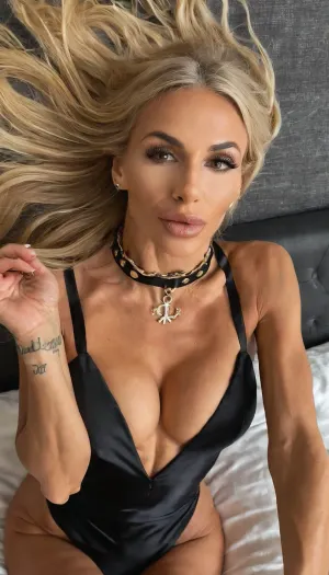 Lying back in bed, blushing, top view, big fake tits, close up, screaming face, ((pov anal)), Black silk dress, anorexic, photoshoot posing, ballerina, ((30 old woman)), handcuffed, choker, tattoos, sexy neck, (tan skin), (fit body:1.3), (beautiful Italian blonde instagram model face), (fit body), very beautiful, perfect skinny body, perfect face, looking at the camera, perfect eyes, (skinny fit), pretty, snub-nosed, long hair, bmbplora, <lora:clothed_small:1.8>, <lora:bimboxl_02:.8>