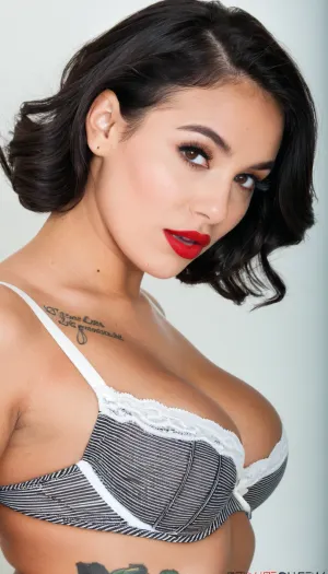 High-end editorial portrait photography of an adult Indian woman, accurately matching the subject’s physical appearance and proportions. Medium close-up framing from upper chest to head, preserving realistic facial structure, eye shape, nose, lips, and jawline. Curvy, full-bodied physique with accentuated bust and soft natural contours.

She wears black lace lingerie with fine texture and visible detailing, layered with an open black-and-white striped garment. Warm brown skin tone with natural texture, subtle highlights. Dark straight black hair with volume, side-parted, falling naturally over the shoulders. Bold red lipstick, defined eyes, minimal but polished editorial makeup. Expressive gaze directed slightly upward and off-camera, calm and confident expression.

Soft, diffused studio lighting, neutral background, controlled contrast to preserve realism. Accurate anatomy, correct proportions, no stylization or exaggeration. Shallow depth of field, sharp focus on face, lingerie fabric, and tattoo text. Clean editorial composition, magazine-quality realism, cinematic photographic style, high resolution.