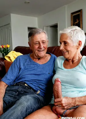 Well hung old grandfather is sitting with his old wife, real casual grandfather with giant cock, grandfather face, livingroom High detailed photo, high quality photo, professionnal photographer