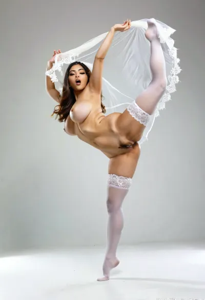 Iranian woman with curvy body, in an artistic nude bridal concept, captured mid-jump or floating with sheer veil and white lace stockings, one garter visible, dynamic motion frozen in time, soft studio background, modern dance-inspired pose, minimal yet bold composition with Persian features and controlled chaos