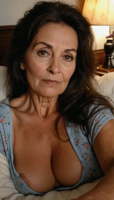 Sexy old granny, 65 years old, dark brunette, long hair, very tall, very curvy, small tits, very tiny boobs, wide shoulders, orgasm horny sexy face, in the morning, sleep face, messy hair, cute pj's, granny woman, looking at the camera, selfie, face focus