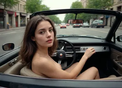 young very slim brunette with naturally small tits, inside a cabrio car, photo taken from the back seats, she drives the car naked, she has her hands on the steering wheel, the car is stopped at a red light, many dressed people cross the street and look at her