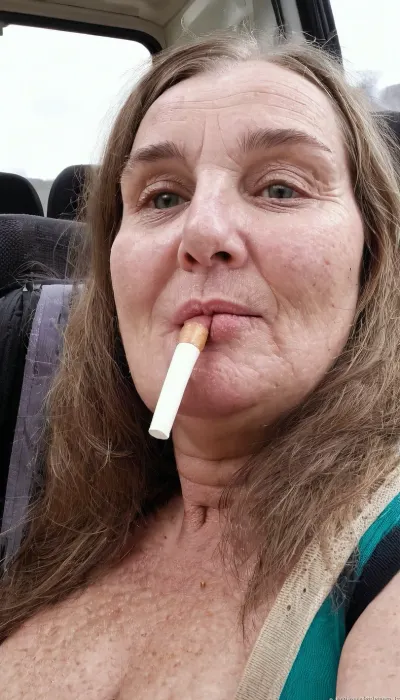 High res, 3/4 view, Slutty old 65yo Whore from Party sitting in bus with many young peaople, (smoking a white cigarette:1.6), curly dark brown hair, fat girl, Perfect Skin, (round face), fat face, double chin, (double chin), (realistic eyes), (detailed eyes), (clean face), Saggy milky boobs, European Girl, (big erect nipples), laughing, European girl, Nightshift, Happy., sagging, breasts, Detailed, natural, and, blemishes, without-makeup, acne, smokinglora, <lora:sagging-000015:.5>, <lora:add-detail-xl:.6>, <lora:skin_4-000015:1>, <lora:smoking_v2:.5>, longnips, <lora:longnipsxl:.5>