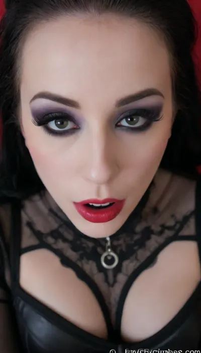 Elsa from Frozen as a evil Disney princess, black goth dress, ((black goth makeup)), close up