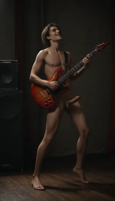 spanish, (male:1.3), gay guy, brown eyes, naked, standing, arched back, legs spread, singing, sceaming, looking up, playing guitar, penis, big penis, smiling, seductive expression, long legs, penis and testicles visible, full body view, in music room, marshall guitar amplifier, studio speaker, (velumia red light from side), designbyjens, red stage spotlights standing on floor pointing at penis, <lora:IGdesignbyjens:.8>, <lora:dark:.6>