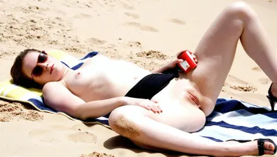 Solo, very Pale skinned Milf in her 40's. She has a small flat chest, (A cup in size), She is lying on a Hot, Sandy beach with her legs spread. Large Vagina open so we can see inside it. She is average in Beauty. No sun glasses, short brown bob haircut