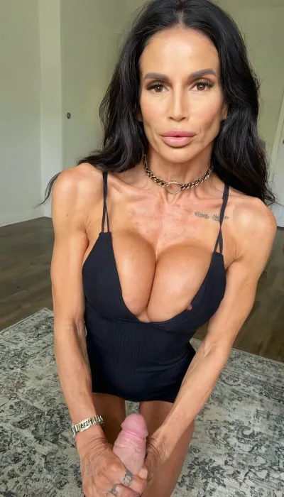 Standing in front of me pov, silk long black cleavage dress, film photo, pov handjob, feet, huge tits, close up, bolted on tits, ((old, 50yo, old skin)), handcuffed, choker, tattoos, sexy neck, ((Indian black hair Demi Moore old mom woman)), (tan skin), (skinny muscle:1.4), (beautiful instagram model face), (fit body), very beautiful, perfect skinny body, perfect face, looking at the camera, perfect eyes, (skinny fit), pretty, snub-nosed, long hair, (crop, top:1), 4ng3l, face, <lora:clothed_small:1.8>, <lora:SDXL_BetterFaces-LoRA_v1:.8>, bmbplora, <lora:bimboxl_02:.8>