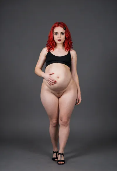 tall curvy pear shaped gothic type woman, small flat chested, tiny perky brests, huge long puffy erect nipples, thick thighs, big hips, tiny waist, long red hair, huge pregnant belly, 9 months pregnant, full body image