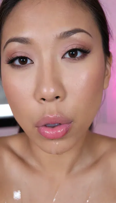 (Pinay Filipina Asian:1.2), (closed mouth), A Filipina's slut face, (27 years old), dark brown tanned skin, (softly overlined lips with muted rosy nude-pink lipstick, (subtle mauve undertones), (slightly deeper pink lip liner defining the edges:1.2), sheer translucent gloss layered over the lipstick, soft reflective highlights on the center of the lips, naturally full-looking lips), (medium-width natural nose), (straight natural nose bridge), (softly rounded slightly bulbous nose tip), (naturally wider nostrils), (subtle nasal width), (nose proportionate to the face), masculine jaw, (softly rounded jawline), (looking straight at camera:1.1), closed lips, (face portrait), (frontal shot), (round to softly oval face), natural facial asymmetry, natural facial proportions, realistic skin texture