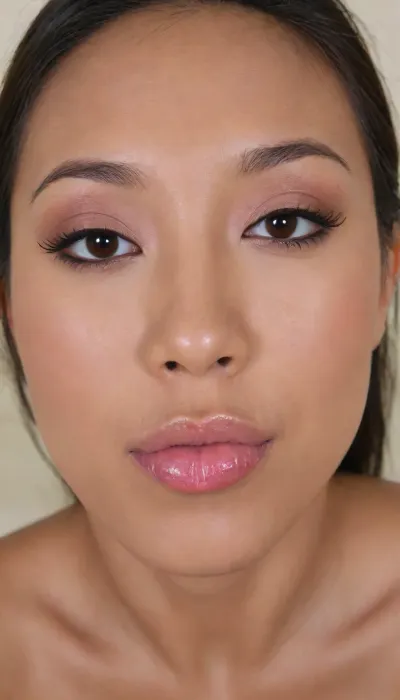 (Pinay Filipina Asian:1.2), (naturally full upper lip:1.2), (tightly closed mouth, lips together:1.2), A Filipina's slut face and shoulders, (27 years old), (warm dark brown tanned skin:1.3), (softly overlined lips with muted dark-rosy nude-pink lipstick, subtle mauve undertones, slightly deeper pink lip liner defining the edges:1.2), sheer translucent gloss layered over the lipstick, soft reflective highlights on the center of the lips, naturally full-looking lips, (medium-sized almond-shaped eyes:1.2), (slightly hooded eyes:1.15), (soft relaxed upper eyelids:1.15), (dark brown eyes), (natural softly defined eyebrows:1.15), (low natural eyebrow arch), (medium-width natural nose:1.15), (straight natural nose bridge:1.15), (moderately broad nose bridge), (softly rounded slightly bulbous nose tip:1.2), (naturally wider nostrils:1.15), (subtle nasal width:1.15), (nose proportionate to the face:1.2), (soft natural nose shape), (softly defined jawline), (slightly strong lower jaw), (full rounded cheeks:1.15), (soft oval face:1.2), (slightly elongated oval face), (natural facial asymmetry:1.15), natural facial proportions, (looking straight at camera:1.1), closed lips, (face portrait), (frontal shot), realistic skin texture