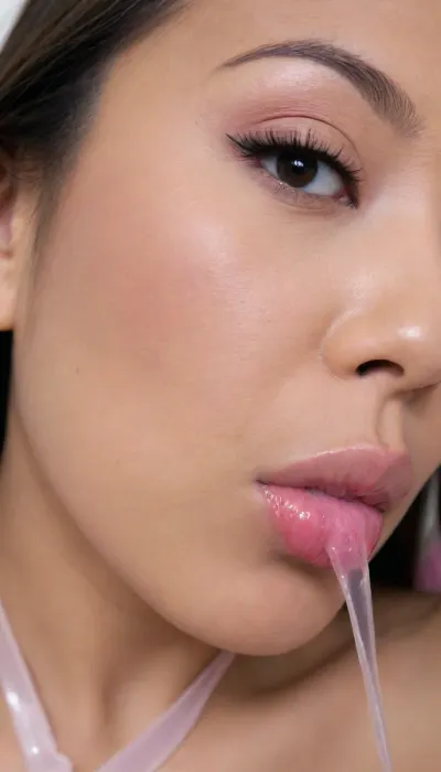 (portrait of a Pinay Filipina Asian:1.2), (tightly closed mouth, lips together:1.3), A Filipina's slut face and shoulders, (27 years old), dark brown tanned skin, (softly overlined lips with muted rosy nude-pink lipstick, (subtle mauve undertones), (slightly deeper pink lip liner defining the edges:1.2), sheer translucent gloss layered over the lipstick, soft reflective highlights on the center of the lips, naturally full-looking lips), (medium-width natural nose), (straight natural nose bridge), (softly rounded slightly bulbous nose tip), (naturally wider nostrils), (subtle nasal width), (nose proportionate to the face), masculine jaw, (softly rounded jawline), (looking straight at camera:1.1), closed lips, (face portrait), (frontal shot), (round to softly oval face), natural facial asymmetry, natural facial proportions, realistic skin texture