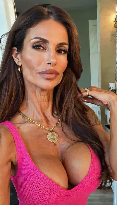 Two sisters, lazy eye, elegant, small fake tits cleavage, pov lapdance, pink knit cleavage sweaters and blue jeans, ((old, 50yo)), handcuffed, gold hoop earrings, nose ring, tattoos, sexy neck, ((old brown hair mom woman)), (tan skin), (skinny muscle), (beautiful Mexican instagram model face), (fit body), very beautiful, perfect skinny body, perfect face, looking at the camera, perfect eyes, (skinny fit), pretty, snub-nosed, long hair, 4ng3l, face, <lora:clothed_small:1.8>, <lora:SDXL_BetterFaces-LoRA_v1:.8>, bmbplora, <lora:bimboxl_02:.8>