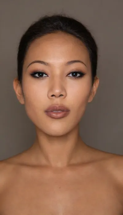 A Filipina's slut face, (narrow flat nose with a surgically sculpted tip), (27 years old), dark brown tanned skin, (very full lips, dark-beige matte lipstick), masculine jaw, looking straight at camera, (closed lips), face portrait, round face