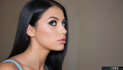 Beautiful tanned girl with long black hair, lipstick and makeup. Black big eyelashes, small, straight, pointed nose. Big eyes light blue. Facial profile from the side