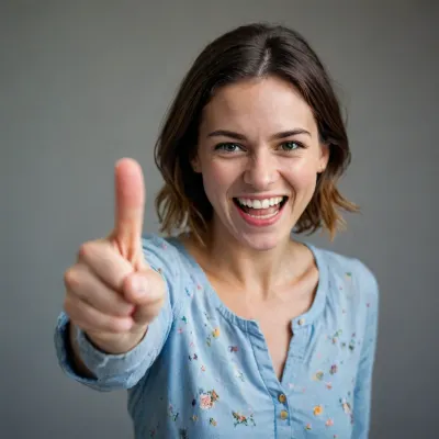 Woman pointing and laughing. Pointing at the camera. Derisively laughing, at the viewer, at the camera, front view, finger pointing at the viewer, finger pointing at the camera