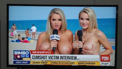 TV screen, news show, sexy girl, Ukrainian blonde sensuous female news anchor на нудистском пляже с микрофоном, two, revealing giant naked breasts, news ticker, 18 yo., co-anchor, BIMBO TOWN news, "CUMSHOT VICTIM INTERVIEW...", "BIKINI OVERVIEW" "26 april".