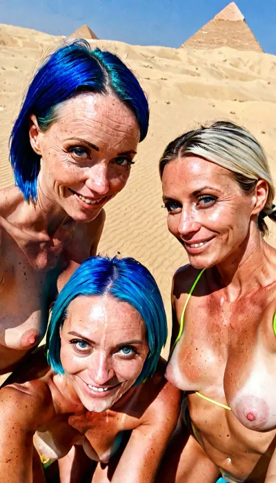 top view, selfie photo in the desert, dunes, pyramids visible in the distance, 3 girls, (first 45 year old Ukrainian girl, blue neon bob hair, sagging small breasts, gentle smile, deeply tanned, realistically detailed eyes, realistically detailed face, realistically detailed tanned skin, oily skin, (old skin:.9), freckles, sagging breasts), (second girl perfect goth slut realistic, green neon hair sporty braid, pale skin, very white skin), (third girl skinny black girl, slim with fake breasts, long loose white hair), girls toplrs, vivid colors, they are all pregnant for 8-9 months, <lora:LCMTurboMix_Euler_A_fix:.8>