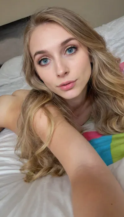 Candid cellphone selfie, nude 20 year old athlete, slender, lying on a photorealistic bed, realistic detailed face, long wavy dirty blonde hair, shy, realistic detailed skin, realistic detailed bright eyes, vivid colors