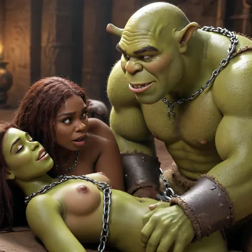 Male Shrek having sex with a very dark black slave girl in doggy with his big green dick while she’s chained down and crying, porn