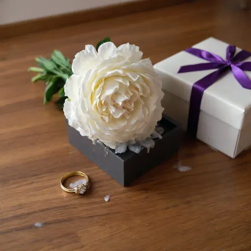 A luxurious bridal bouquet, elegantly arranged and placed next to an open velvet wedding ring box showcasing two shiny gold wedding rings. cum is oozing over the bouquet and dripping onto the rings and their box. Some of the cum has spilled onto the wooden table surface, creating reflective, sticky puddles. The scene is beautifully lit with natural soft light, creating a romantic yet surreal contrast between elegance and the unsettling presence of the cum.

hyper-realistic, elegant, cinematic lighting, macro lens, depth of field, soft shadows, luxurious, surreal, detailed textures, reflections