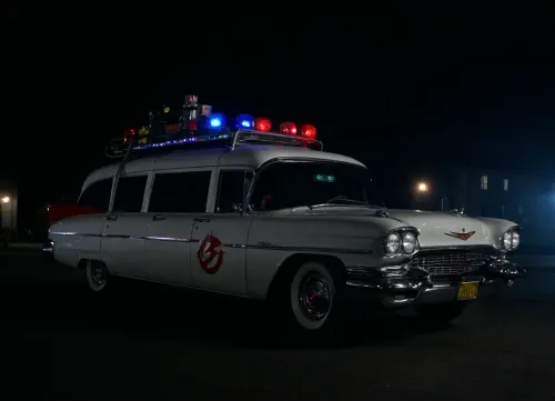 Ecto-1 from Ghostbusters, (Ghostbusters), Night, Dark Sky, Street of New York, Dark Streets, Lights of Cadillac Miller-Meteor Sentine of 1959, Limo-Style Endloader Combination Car, (Driving Effects, Flashing Lights are On, Flashing Lights Effects, Speed Effects), Side View from Below, <lora:dark:.5>
