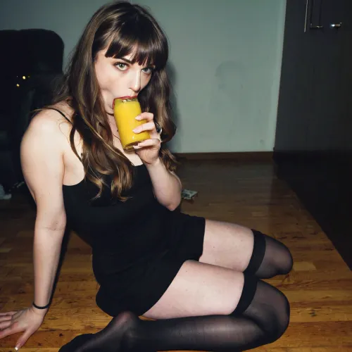 A grunge girl's solitude: a moment caught on analogue film at a '90s party