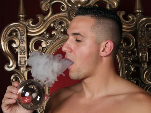 Hot man on the Throne, latino, buzzcut, smoking glass spehere with stem, and blowing out his mouth white clouds