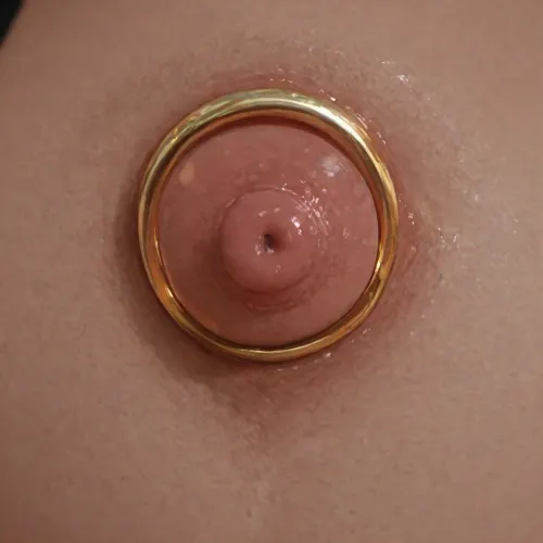 Close-up photo in Raw format, 8k uhd, high quality, high resolution, super detailed, professional photography, photorealism, realistic, I put three gold rings on each big nipple of my boobs