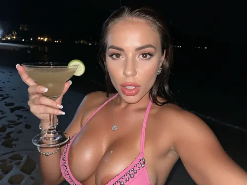 Selfie photo, night beach thailand, Caucasian woman, fully clothed, housewife, in the public beach woman on, (She is a waiter with a cocktail in her hands.), pink micro bikini, beautiful, elegant, classy, oval-shaped face, voluptuous, heavily seamless suntanned body, tanlines, big brown eyes, arched eyebrows, big glossy lips, (brown hair:1.4), Brown hair, τhe hair is tightly slicked back at the sides and temples., wet body, necklace, earrings, bracelets, (looking straight at the camera with a seductive lustful gaze)