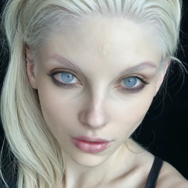 macro shot, breathtaking 18 years old goth girl, A lustful face, (pale ivory skin tone:1.5), glistening skin, soft, feminine features, blue and grey colored mesmerizing eyes, perfect skinny body, medium perky fake breasts, perfect face, smooth silky long hair, slim waist, nice perky tits, professional photograph, ultra detailed, intricate details, (photorealistic:1.5), 8k, UHD, (masterpiece:1), depth of field, soft front light, HDR, (muted colors:1.2), Canon RF 100mm F2.8L Macro IS USM, <lora:SDXL_BetterFaces-LoRA_v1:.8>