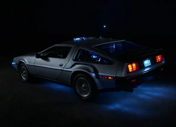 DeLorean from BTTF, (Back to the Future), Night, Dark Sky, Road in Desert, Real Road, Lights of DeLorean, (Travel Time Effects, Driving to 88mph, Blue Lights on Components Located on the Wings of the DeLorean, ((Blue Flash, Blue Flashes from the DeLorean, Blue Fire Flashes))), Marty McFly Sits in the DeLorean and Drives it, Side View from Above, <lora:dark:.5>