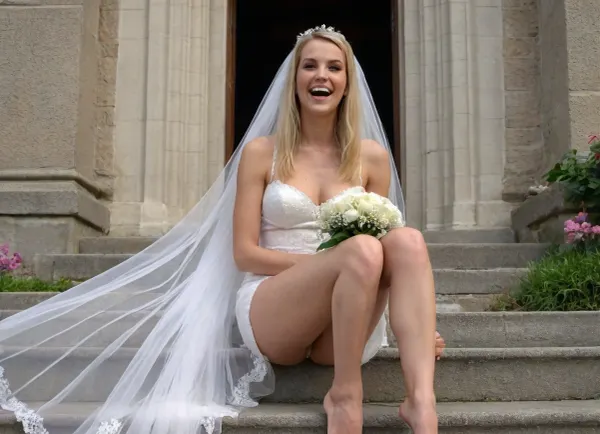 voyeur, wedding, wedding photo service, bride from far, outdoor, sit in front of a church, from below, sit on the steps, outdooor, open church door in the background, many people inside, Pantyless bride, blonde Polish MILF bride, handling a flower bouquet, Deanna troy face, long face, European MILF, skinny, skully, straight hair, veil on head, realistic, upskirt, showing legs, joyfull, happy, ((evil laugh)), <lora:1228684_training_data:.8>