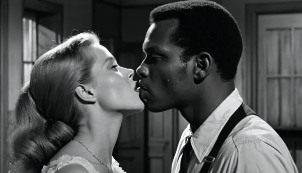 1968, 35mm b&w, George Romero's film Night of the Living Dead, scene with interracial couple, a white woman kisses a black man in a dilapidated house, zombies try to break.