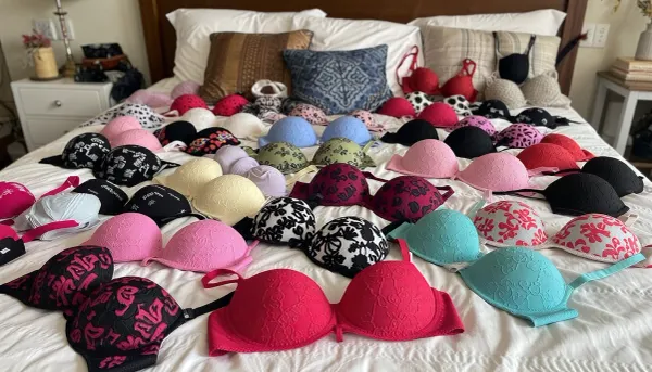 large bed, colorful lace bras every where on the bed