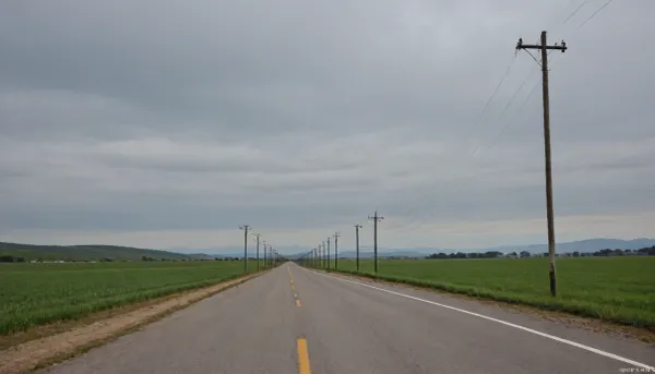 (in Michael Whelan art style), straight narrow old asphalt road stretches away into the distance, along the road are bright green fields and poles with wires on the right, a bright blue sky with white clouds, low mountains on the horizon far away, (saturated bright colors, high definition image, high contrast colors)